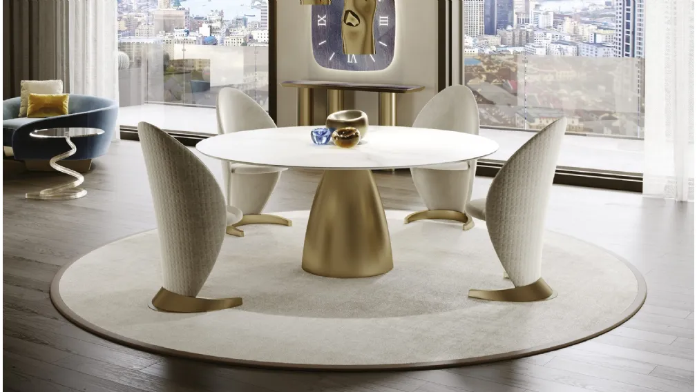 Tavolo rotondo con base in metallo finitura ottone e top in MarmoReflex Botero 72 di Reflex