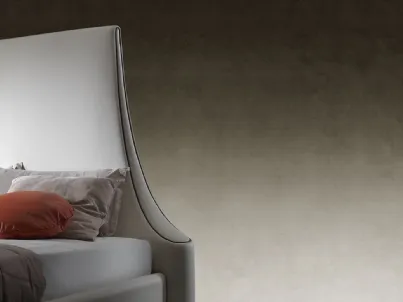 Letto di design con testiera sagomata in pelle e box contenitore Romeo di Reflex
