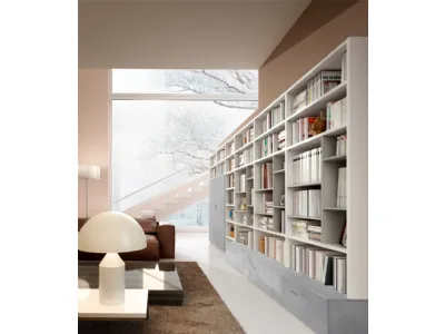 Libreria a muro Living 78D con vani a giorno e ante in materico effetto cemento di Ferrimobili